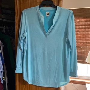 Robin egg blue shirt with white polka dot pattern